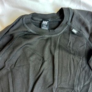 Helly Hansen kids base layer. Top and bottom. Size 128/8